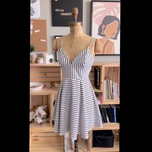 Short dress with adjustable straps. Soft and easy to throw on!